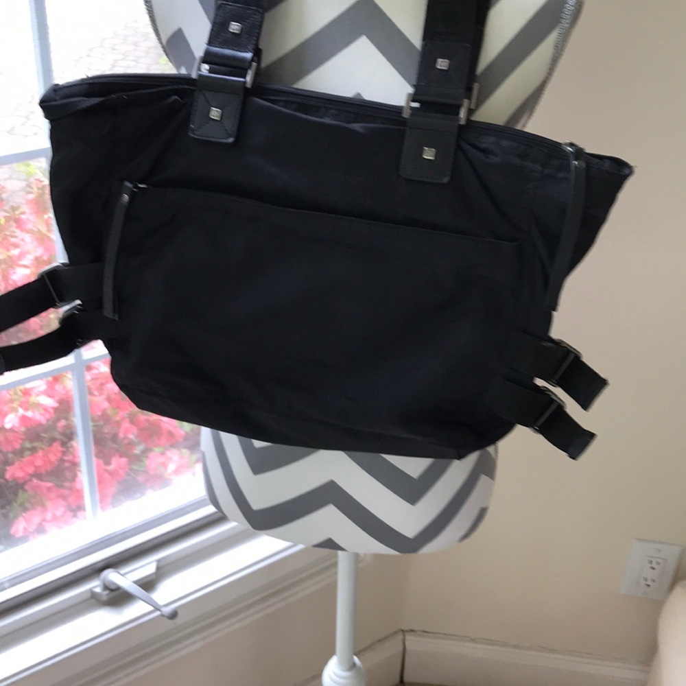 Great bag for storage. Strong nylon with adj. stra